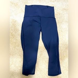 Lululemon navy 3/4 length pants with sheer side panels